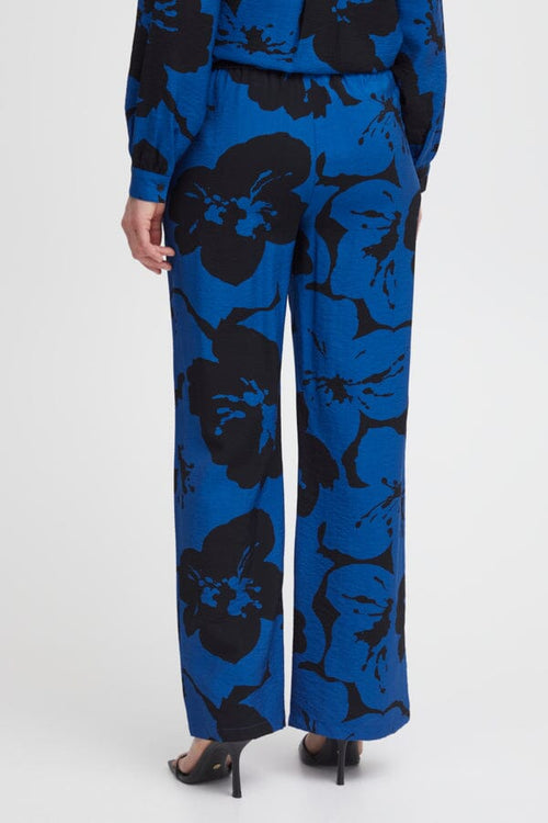 IBINE AOP Wide Leg Bold Floral Trousers in Black and Blue Trousers B.Young